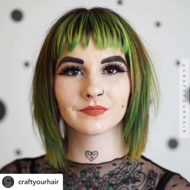 Beautiful woman with bob haircut and baby bangs.