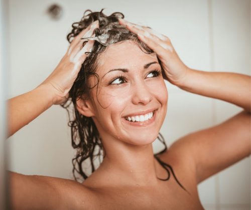 Woman washing her hair.