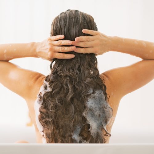 Woman washing her hair.